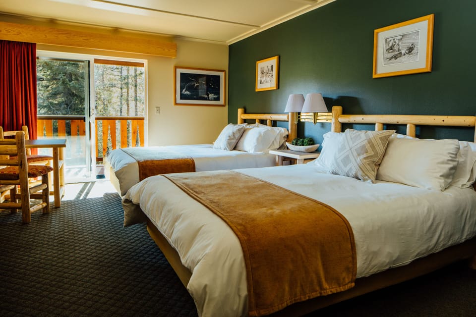 Deluxe Room, 2 Queen Beds, Balcony | Desk, laptop workspace, blackout drapes, free WiFi