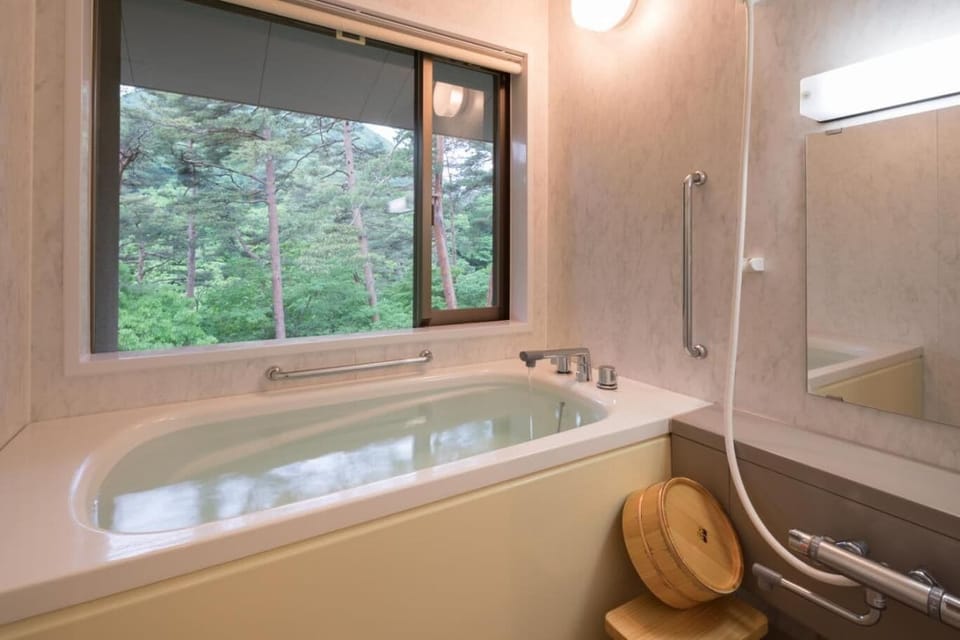 Twin Room | Bathroom | Separate tub and shower, deep soaking tub, free toiletries, hair dryer