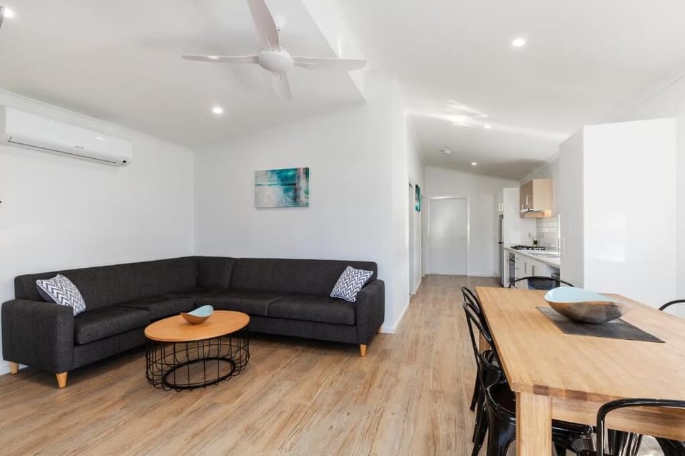 Deluxe Poolside Accessible 2 Bedroom Cabin | Living area | TV, DVD player