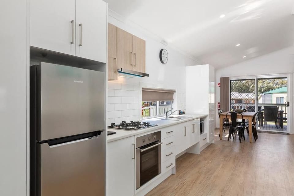 Deluxe Poolside Accessible 2 Bedroom Cabin | Private kitchen | Full-size fridge, microwave, stovetop, electric kettle