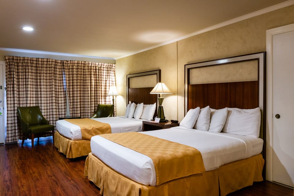 Premium bedding, desk, blackout drapes, iron/ironing board