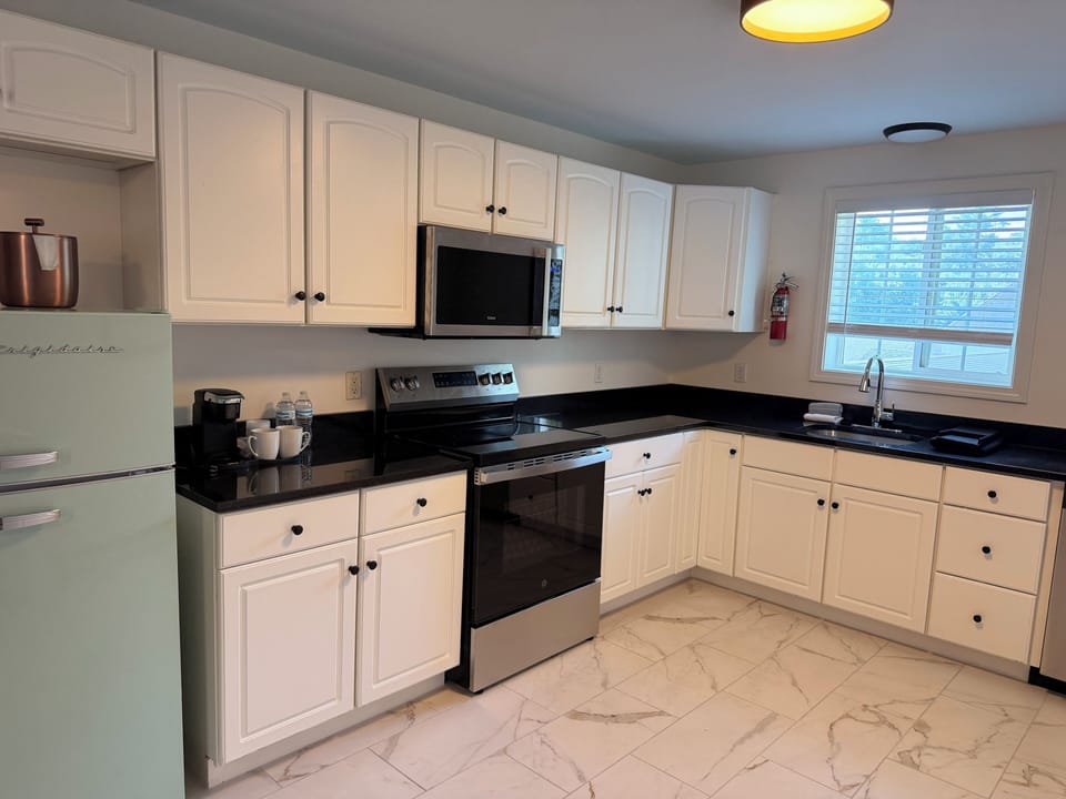Apartment, 2 Bedrooms | Private kitchen | Coffee/tea maker, mini-fridge