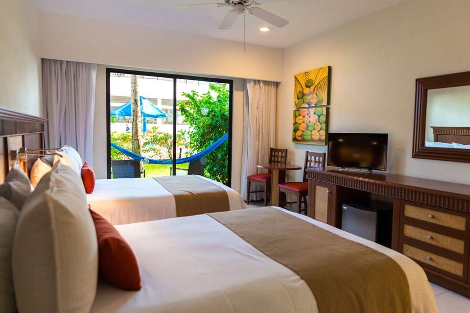 In-room safe, blackout drapes, iron/ironing board, bed sheets