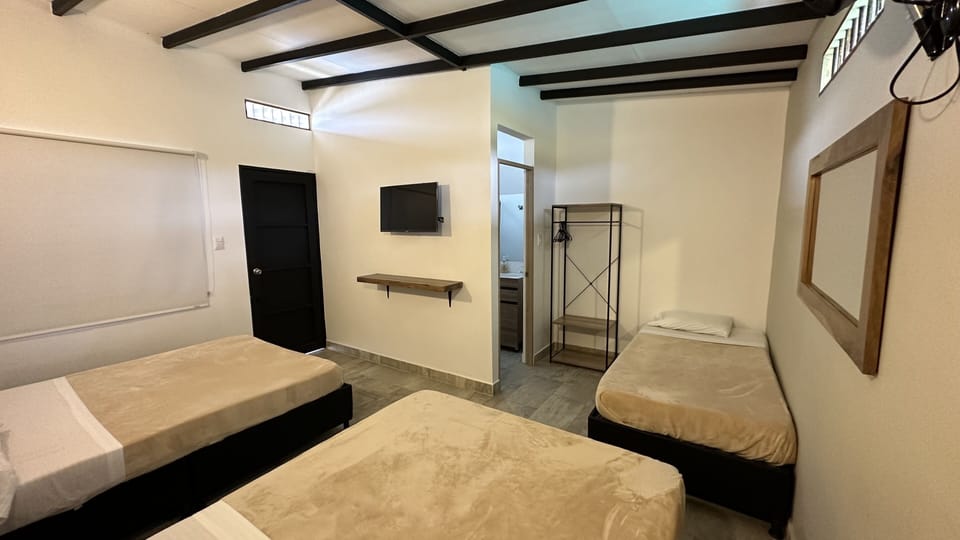 Family Room | Minibar, free WiFi, bed sheets, wheelchair access