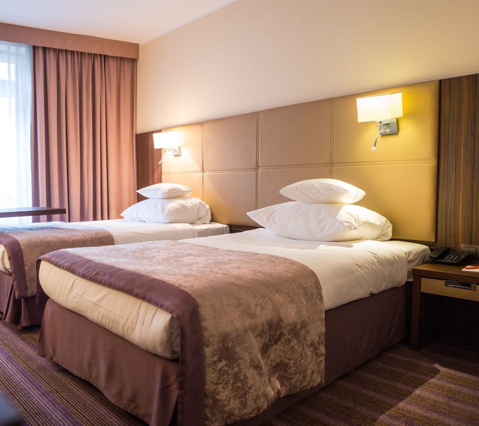 Premium bedding, free minibar, in-room safe, desk