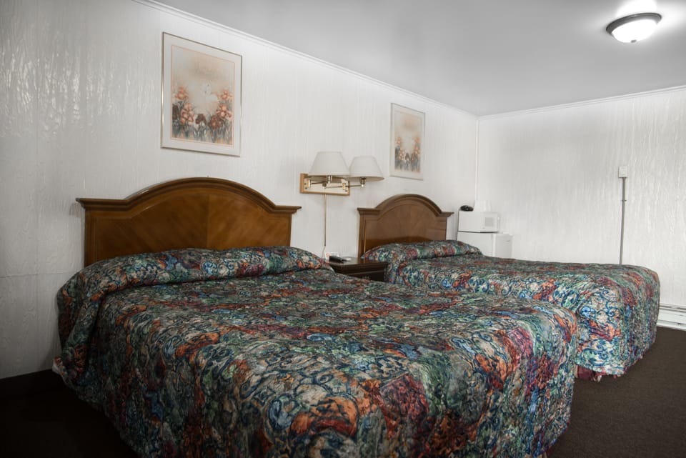 Room, 2 Queen Beds | Iron/ironing board, free WiFi, bed sheets