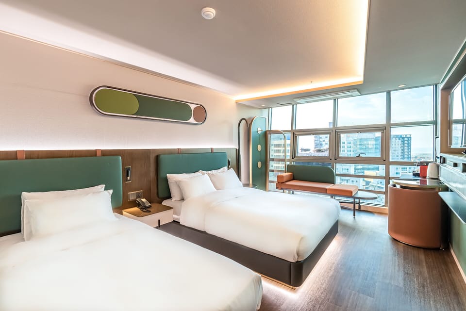 Premium Twin Room, City View | Desk, laptop workspace, blackout drapes, free WiFi