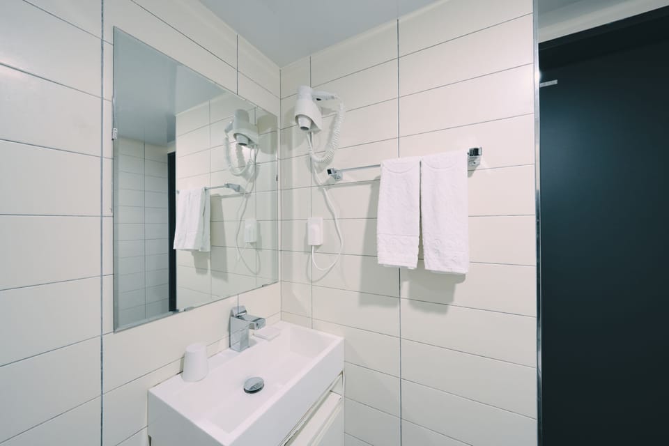 Panoramic Room, 2 Queen Beds, Non Smoking, Ocean View | Bathroom | Shower, free toiletries, hair dryer, slippers