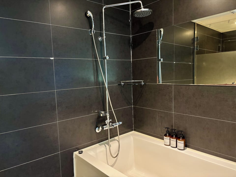 City Twin Room | Bathroom | Slippers, towels