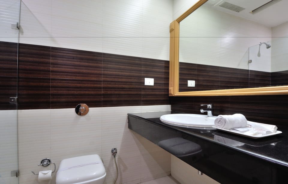 Shower, free toiletries, hair dryer, slippers
