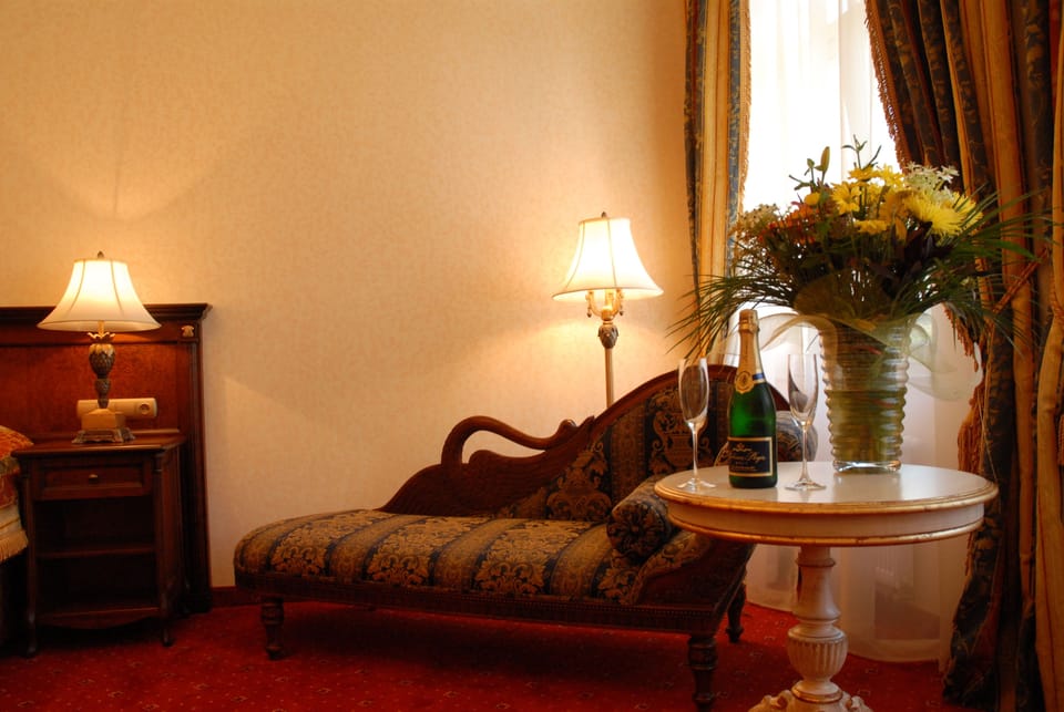 Classic Double Room, City View | Living area | Flat-screen TV