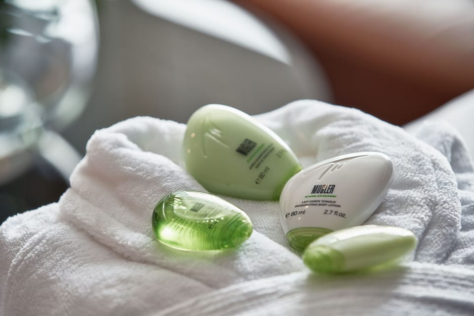Shower, rainfall showerhead, designer toiletries, hair dryer