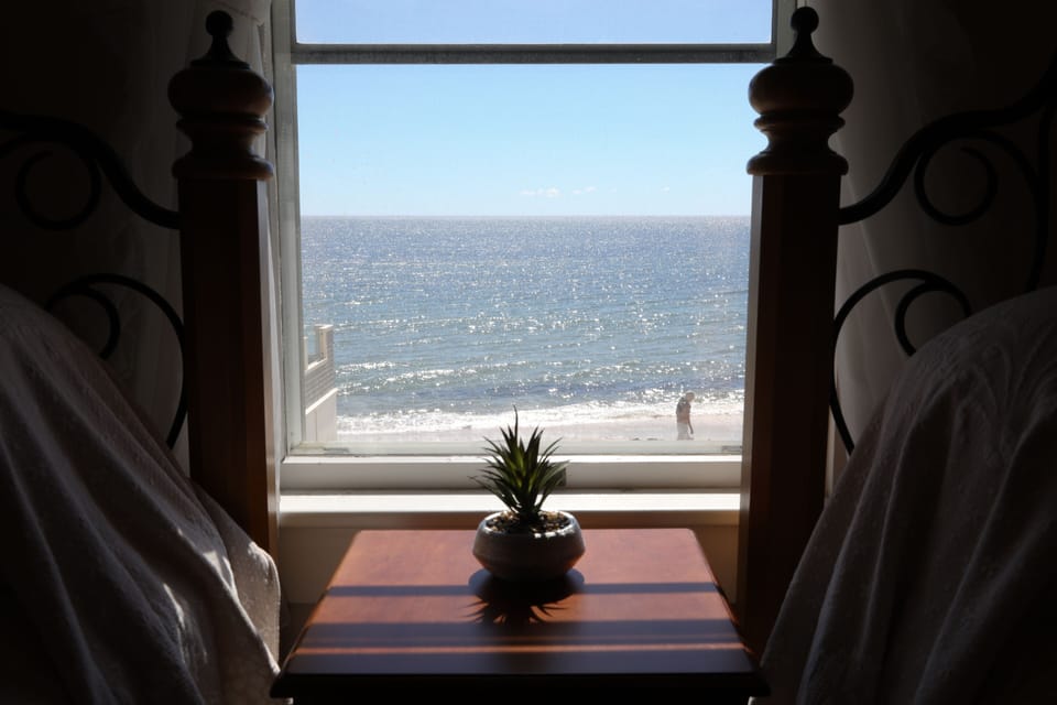 Panoramic Quadruple Room, Private Bathroom, Ocean View (Room 202) | Beach/ocean view