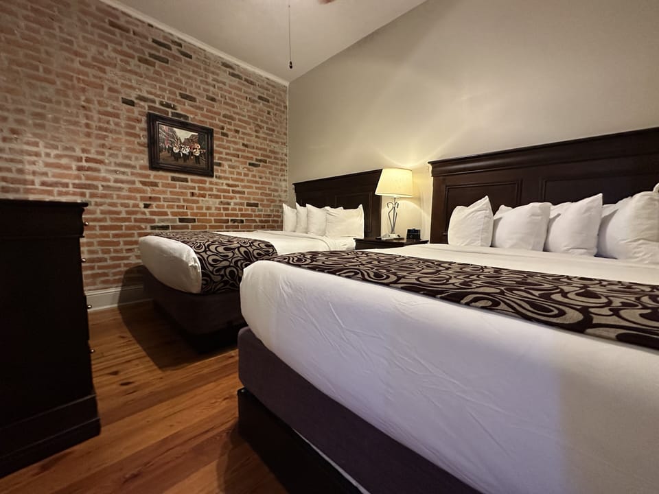 Suite, Non Smoking | Premium bedding, pillowtop beds, individually decorated, desk
