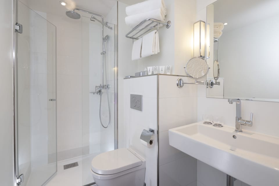 Shower, free toiletries, hair dryer, towels
