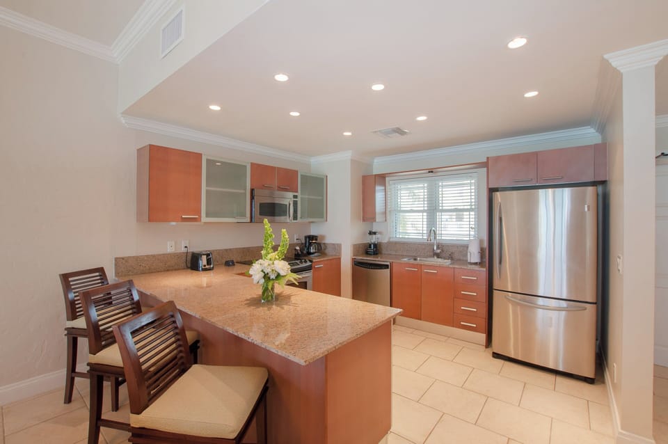 Suite, 1 Bedroom, Oceanfront | Private kitchen | Coffee/tea maker, fridge, microwave, cookware/dishes/utensils