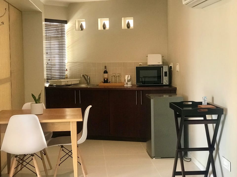 Family Suite with kitchenette and Ocean View | Private kitchen | Fridge, coffee/tea maker, electric kettle