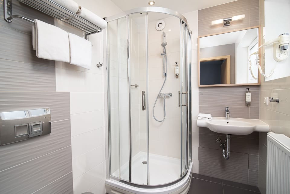 Shower, free toiletries, hair dryer, towels