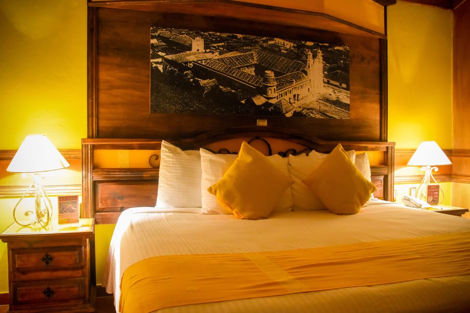 Comfort Quadruple Room | Premium bedding, in-room safe, desk, iron/ironing board