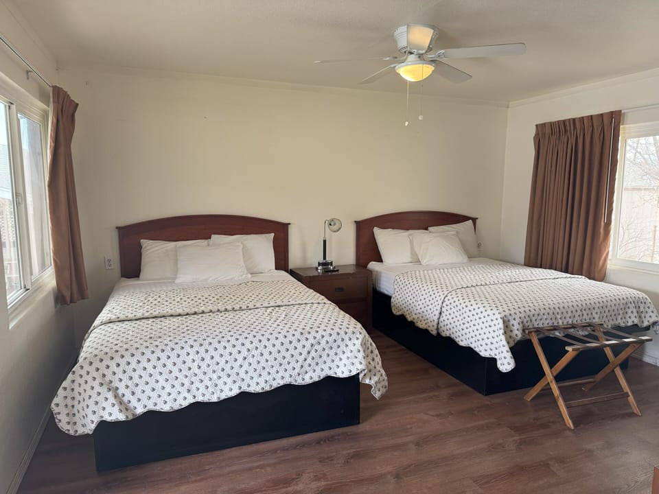 Standard Room, 2 Queen Beds | 1 bedroom, individually decorated, individually furnished