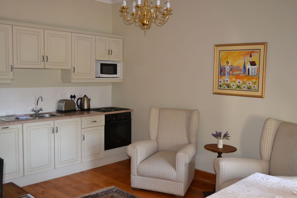 Luxury Honeymoon Suites | Private kitchen | Coffee/tea maker, electric kettle, highchair