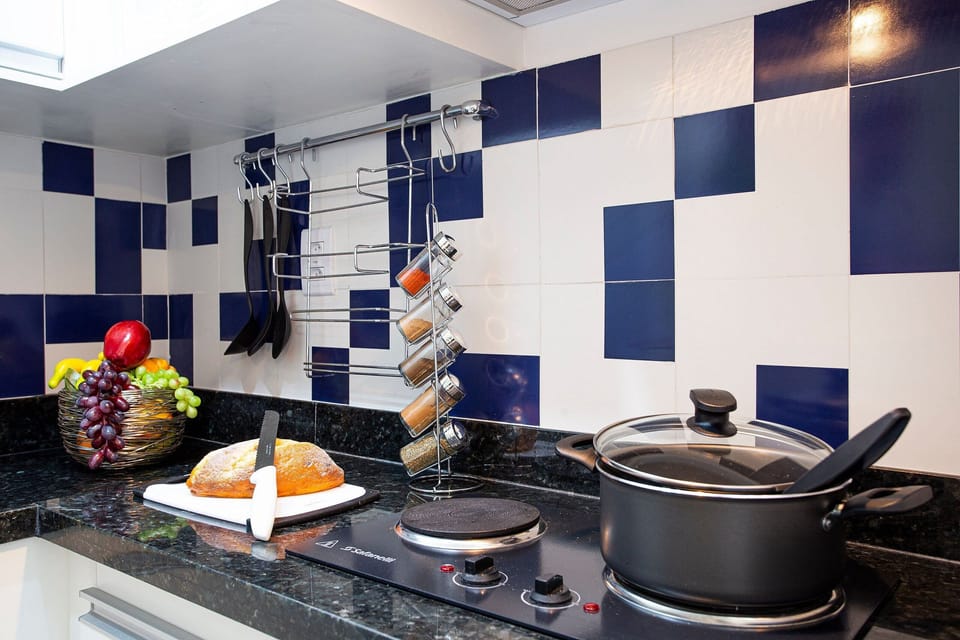 Apartment | Private kitchen | Fridge, microwave, blender, cookware/dishes/utensils