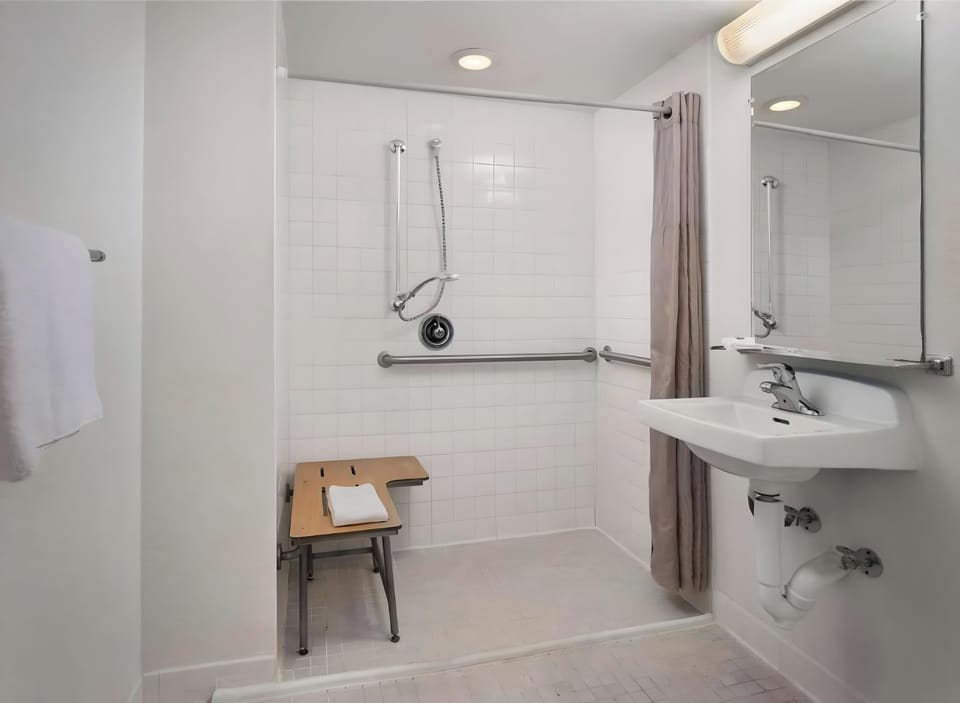Shower, hair dryer, soap, shampoo