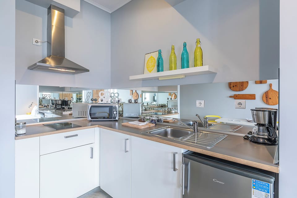 Superior Suite, 1 Double Bed, River View | Private kitchen | Full-size fridge, microwave, stovetop, coffee/tea maker