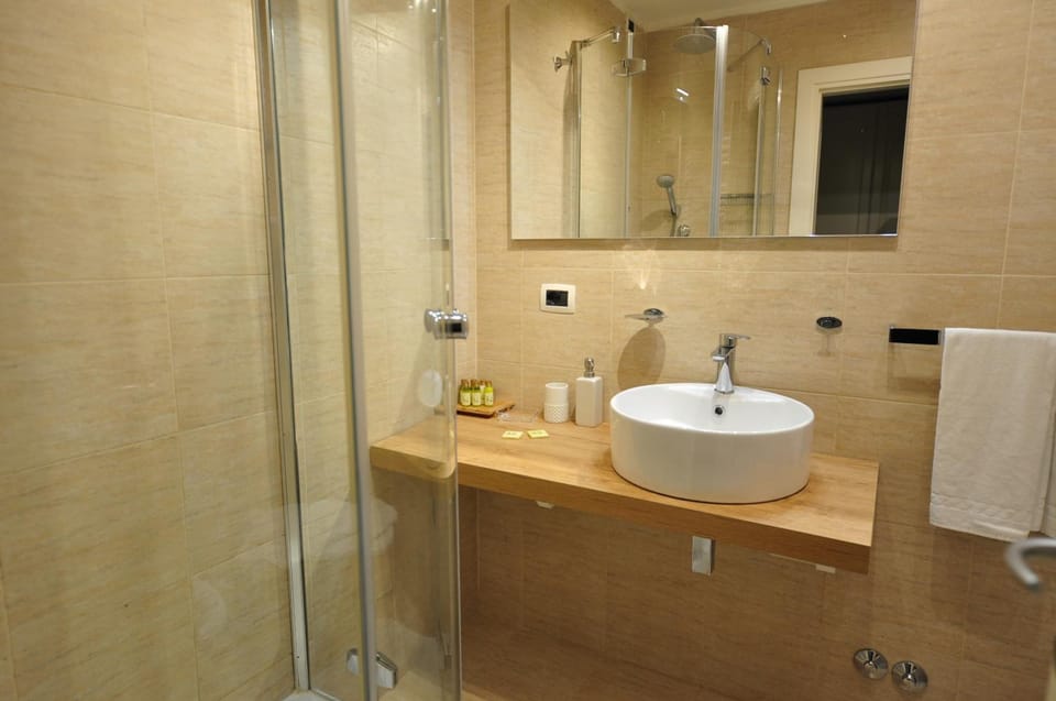 Combined shower/tub, free toiletries, hair dryer, bathrobes