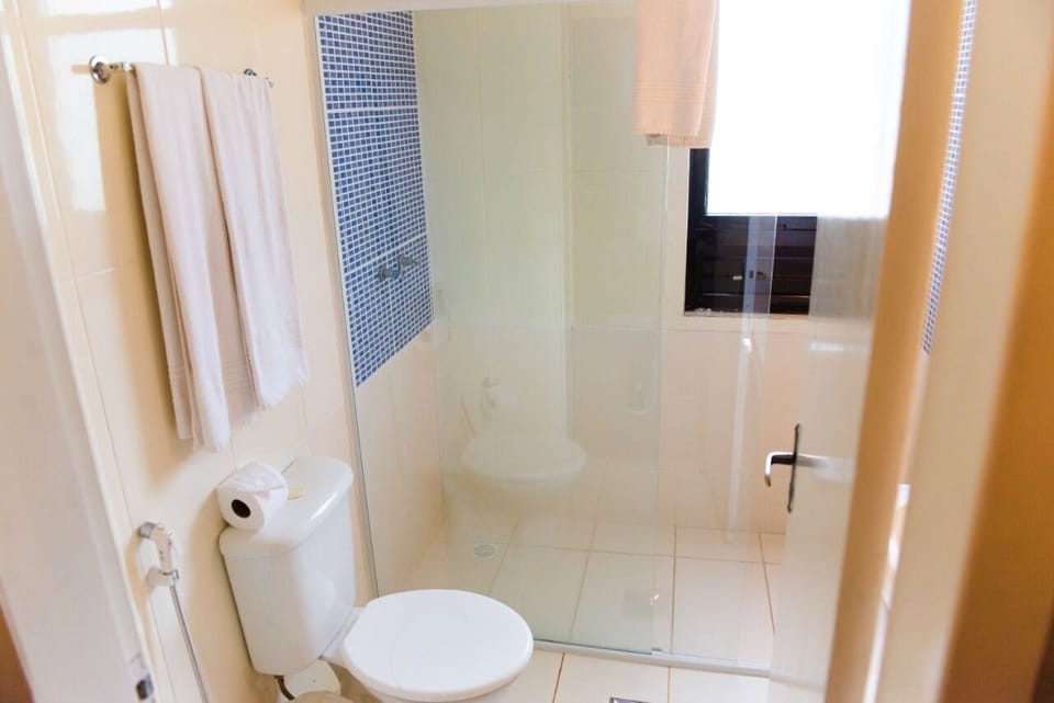 Standard Room | Bathroom | Shower, hair dryer, towels