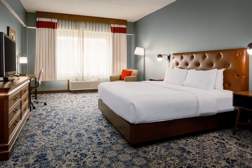 Hypo-allergenic bedding, down comforters, pillowtop beds, in-room safe