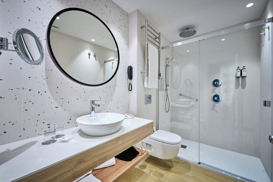 Eco-friendly toiletries, hair dryer, towels