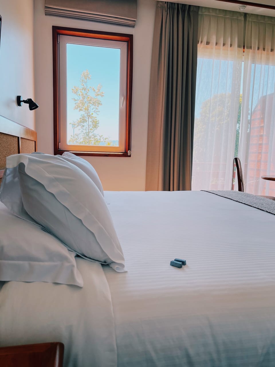 Premium bedding, down comforters, pillowtop beds, minibar