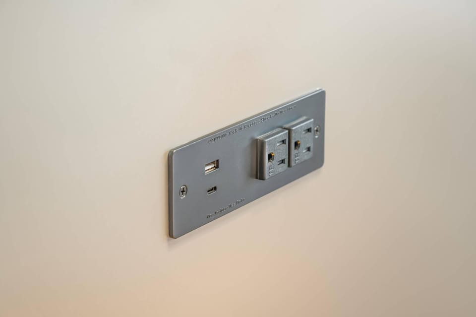 Desk, blackout drapes, iron/ironing board, free cribs/infant beds