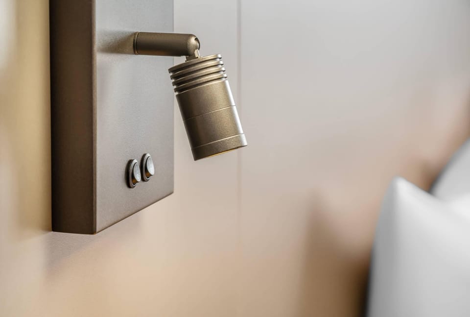 Desk, blackout drapes, iron/ironing board, free cribs/infant beds