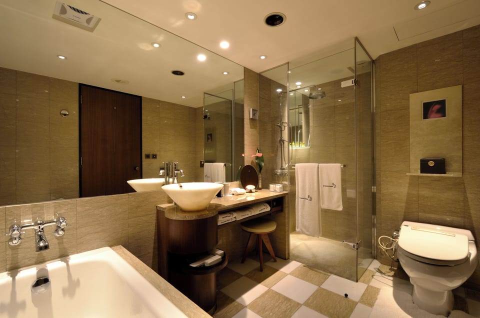 Superior Twin Room, 2 Single Beds | Bathroom | Separate tub and shower, rainfall showerhead, hair dryer, bathrobes