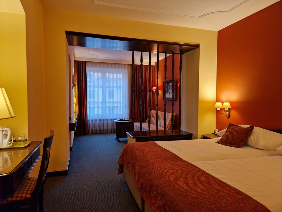 Junior Suite, 2 Twin Beds | Down comforters, in-room safe, desk, blackout drapes