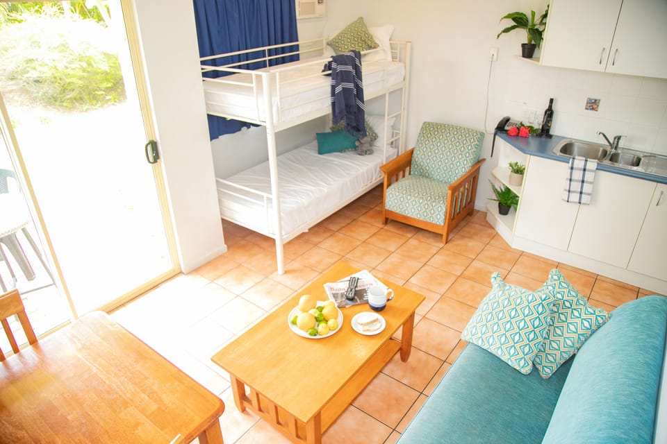 One Bedroom Apartment Queen / Bunk Not Pet Friendly | Living area | 50-inch flat-screen TV with digital channels, TV