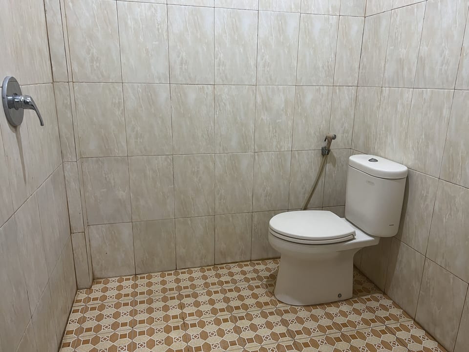 Basic Double Room | Bathroom | Shower, towels, soap