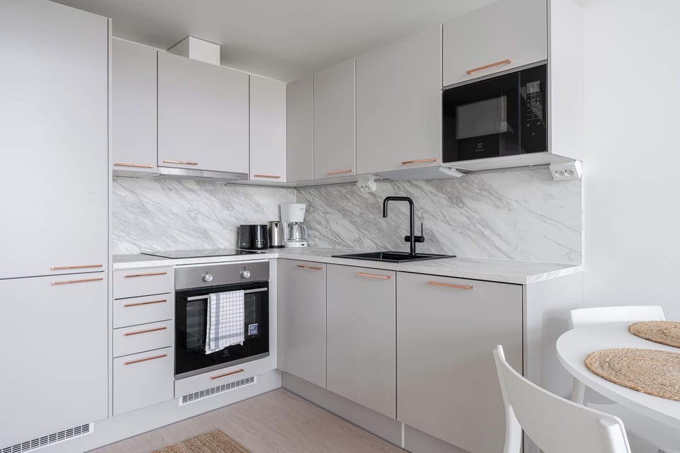 Design Apartment | Private kitchen | Full-size fridge, microwave, oven, stovetop