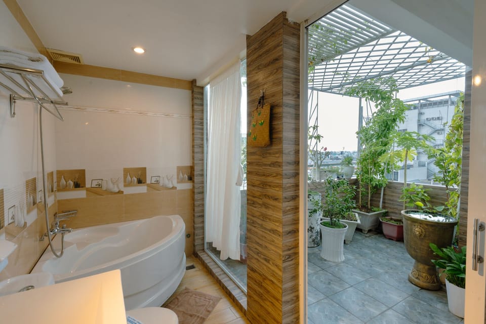 Premier Room | Bathroom | Free toiletries, hair dryer, slippers, towels