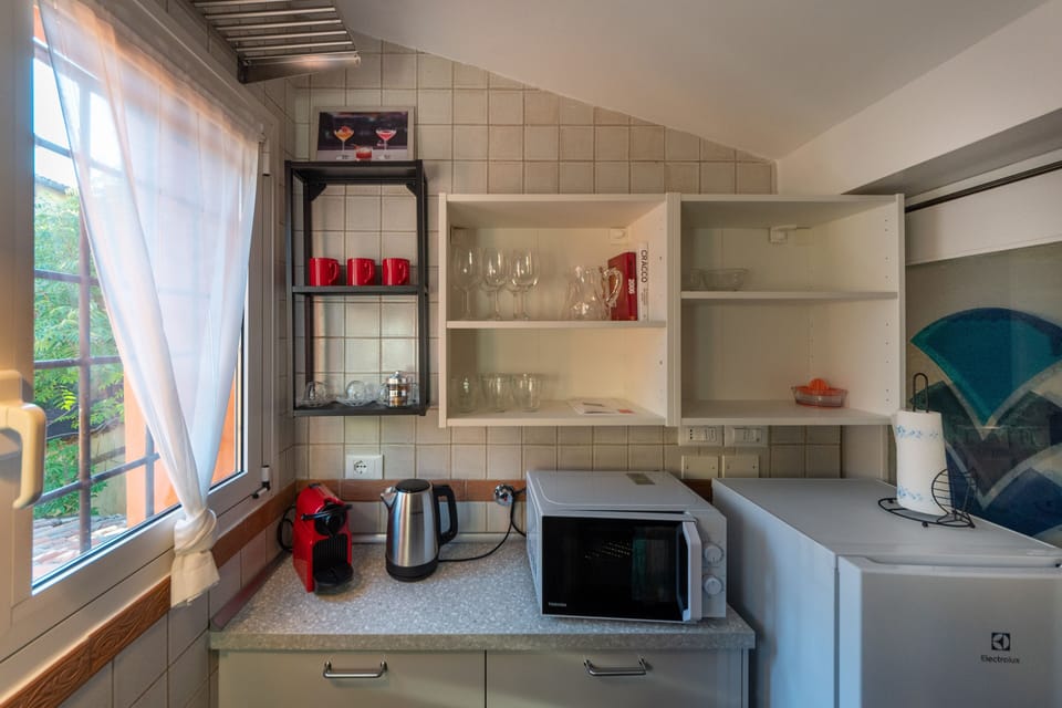 Apartment | Private kitchen | Full-size fridge, microwave, oven, stovetop