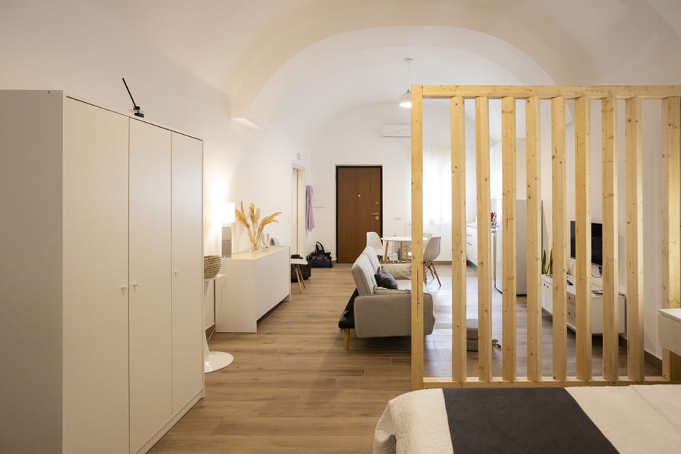 Deluxe Studio | Premium bedding, down comforters, desk, laptop workspace
