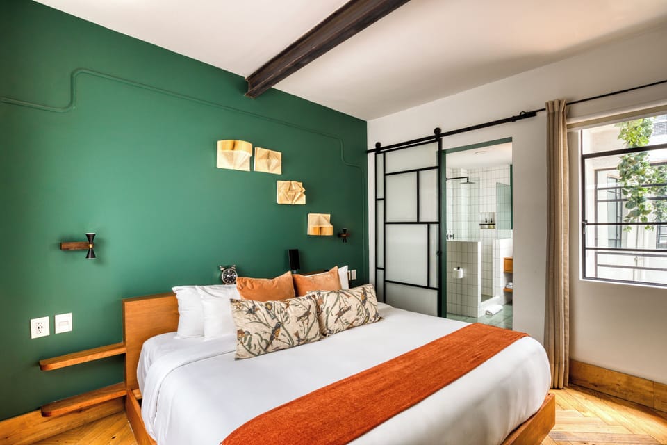SUITE | Premium bedding, down comforters, minibar, in-room safe
