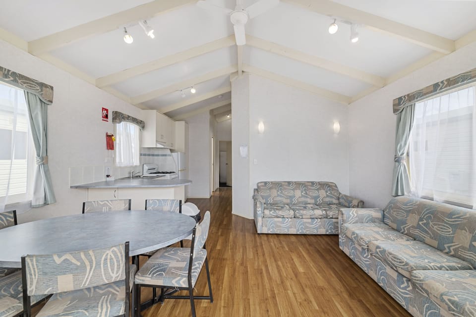 3 Bedroom Family Cabin | Living area | Flat-screen TV