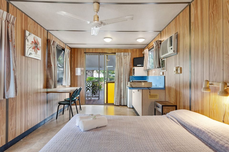 Double Bungalow with Private Bathroom | Living area | Flat-screen TV