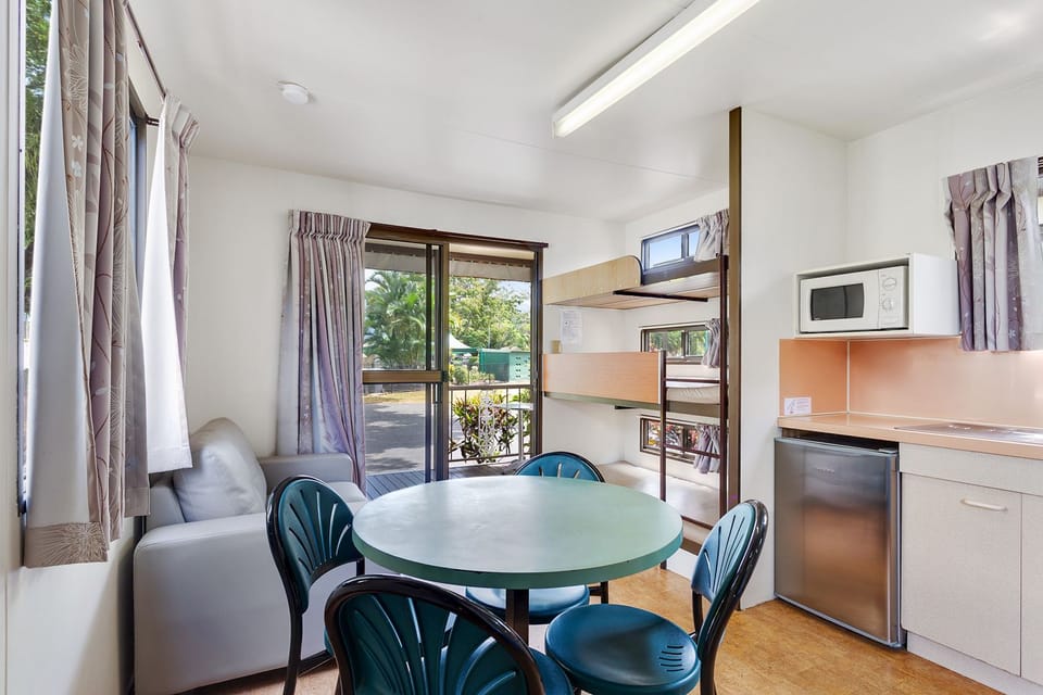 Family Bungalow, Multiple Beds | Living area | Flat-screen TV