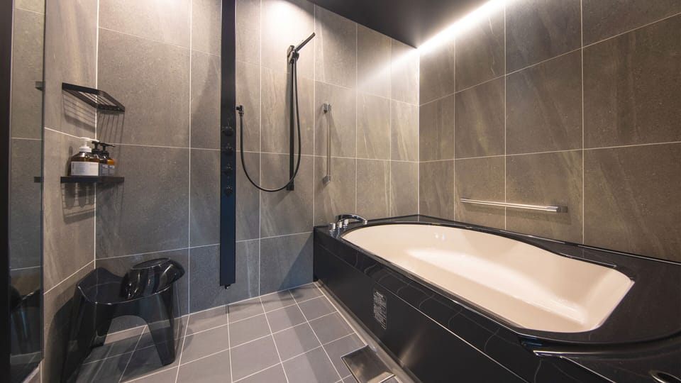 Premium Twin Room | Bathroom | Combined shower/tub, deep soaking tub, free toiletries, hair dryer