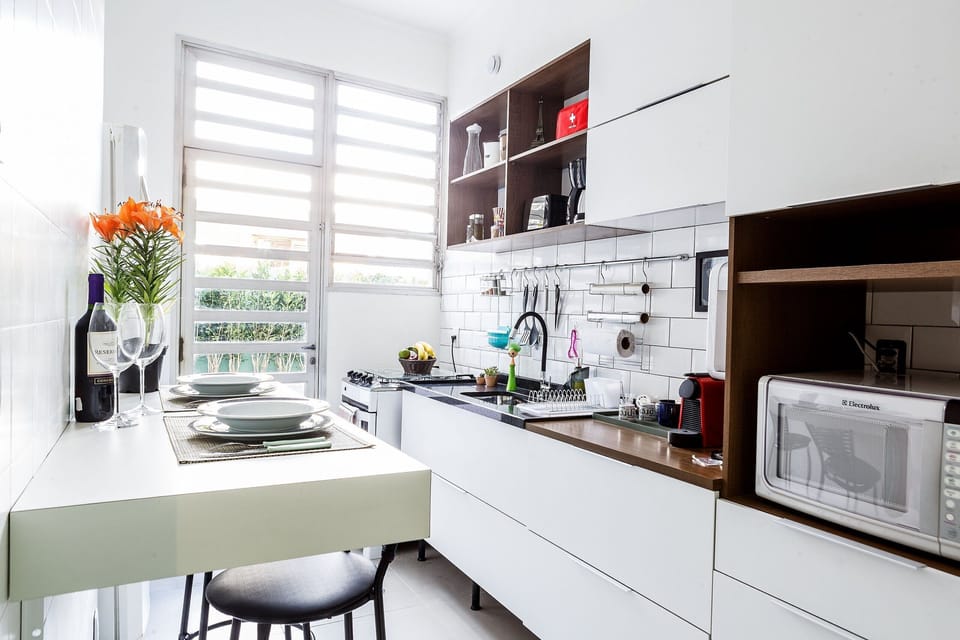 Villa | Private kitchen | Fridge, microwave, blender, cookware/dishes/utensils