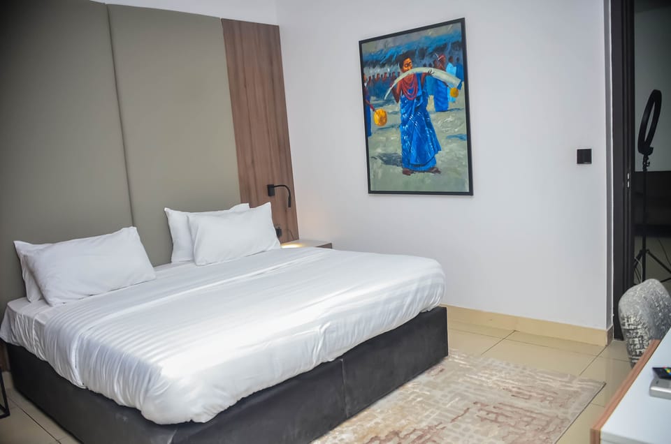 Standard Suite, 1 King Bed, Lagoon View, Garden Area | Premium bedding, individually decorated, individually furnished, desk